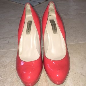 L.K. Bennett orange pumps.
